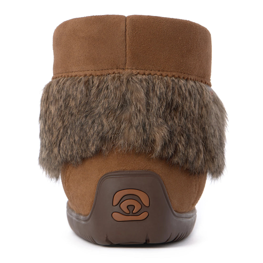 Brown suede boot with faux fur trim and a thick sole. The back features a small embossed logo. 