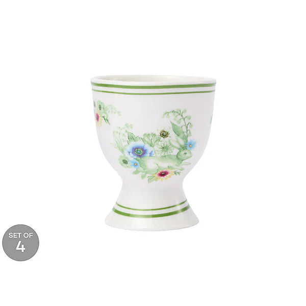 Decorative ceramic egg cup with floral design on a white background