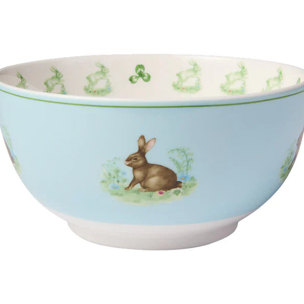 Ceramic bowl with rabbit design on a light blue background