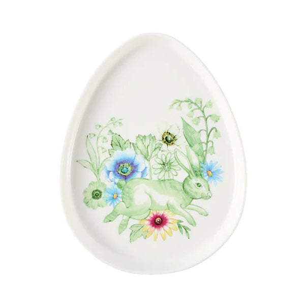 Decorative egg with a green rabbit and floral design on a white background