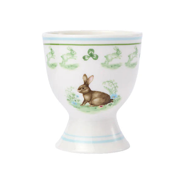 Decorative egg cup with a rabbit design on a white background