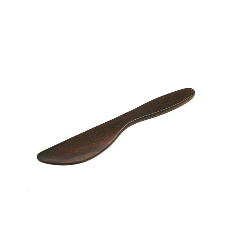 Dark-wood knife on a white background