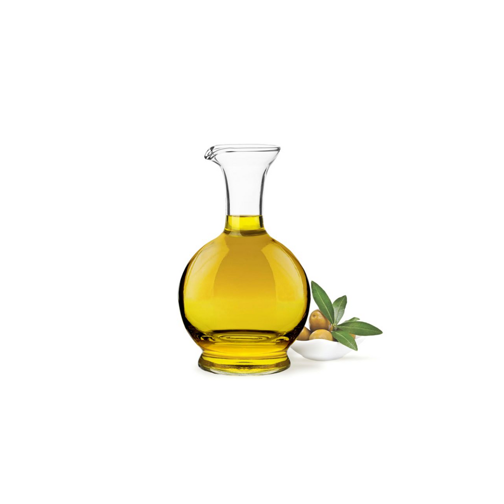 Clear glass carafe on a white background filled with oil.