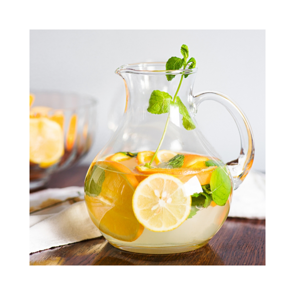 Pitcher filled with lemons and mint.