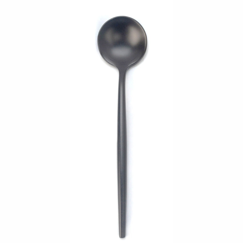Black-colored spoon on a white background