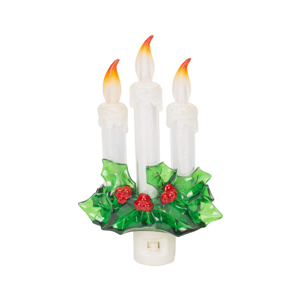 Decorative night light with three candle-like lights and a holly design on a white background