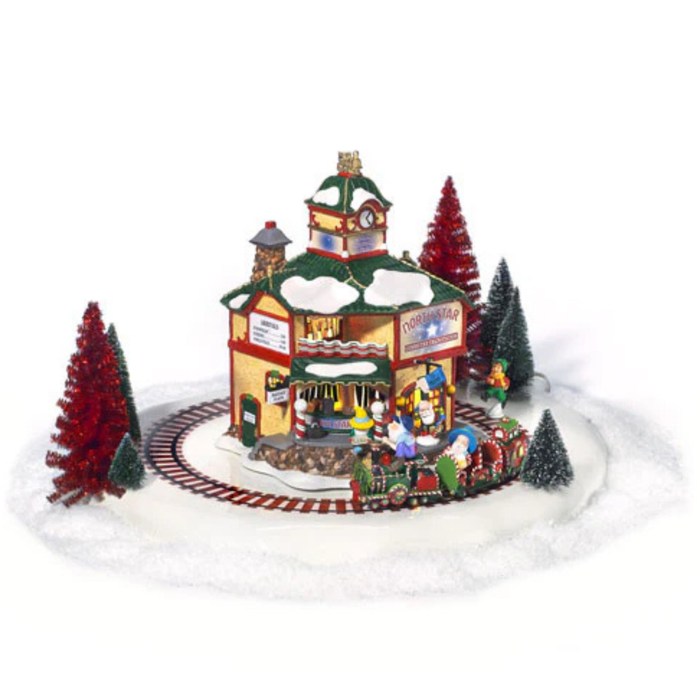 A decorative building with a train track surrounding building against a white background. 