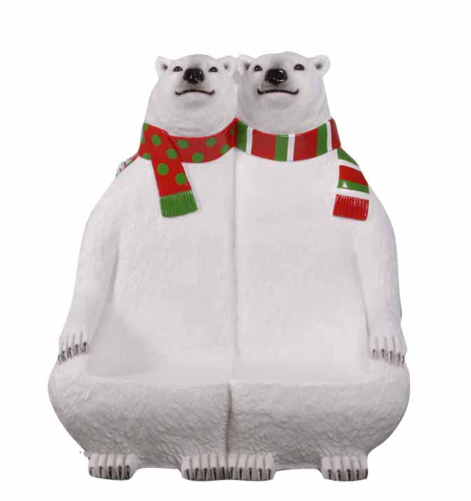 Two polar bears wearing red scarves with green polka dots on a white background