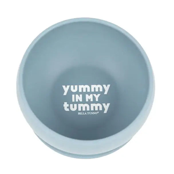 Blue bowl with 'yummy in my tummy' text on a white background