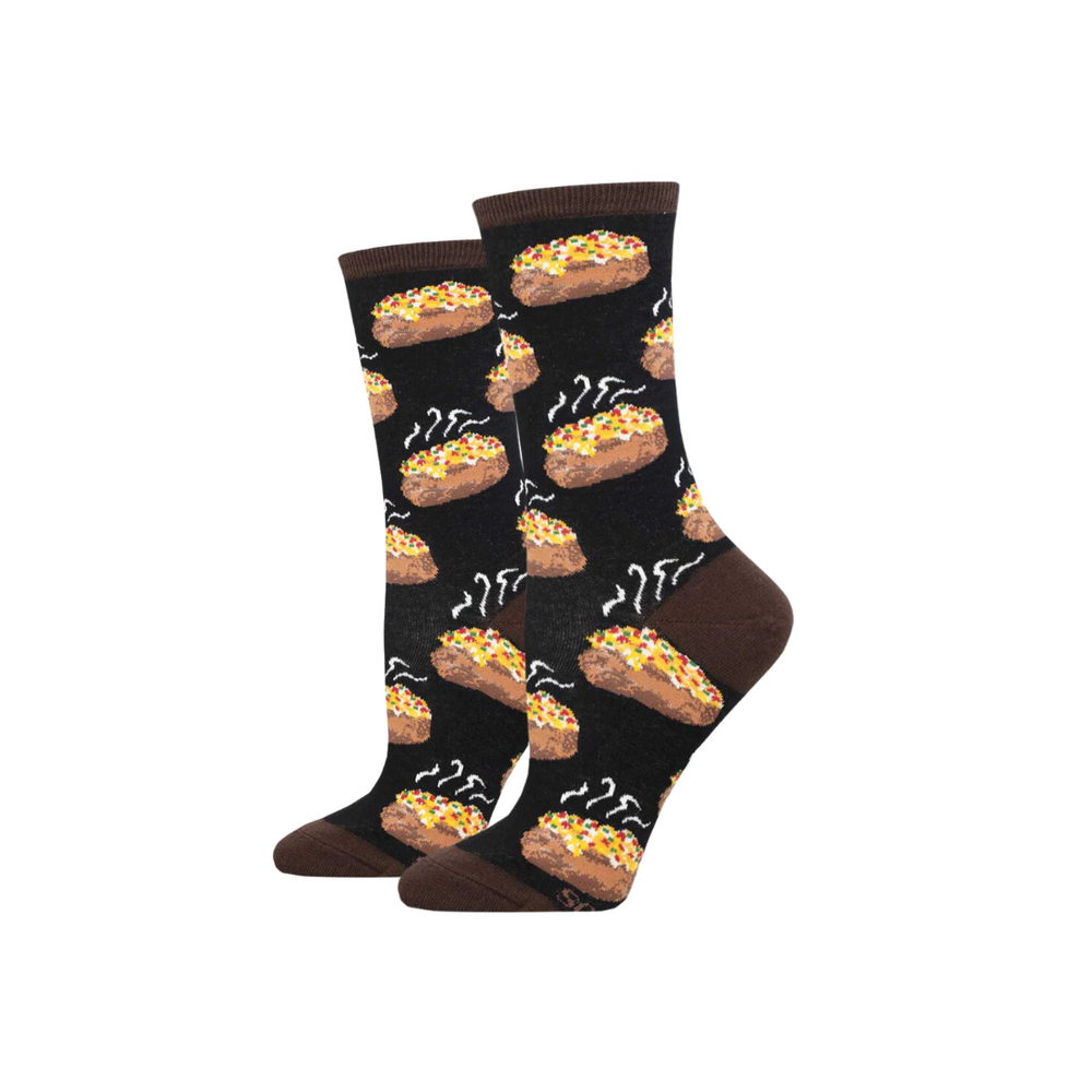 A pair of black socks with a baking design and the text 'baked is good, twice-baked is even better' printed on them.