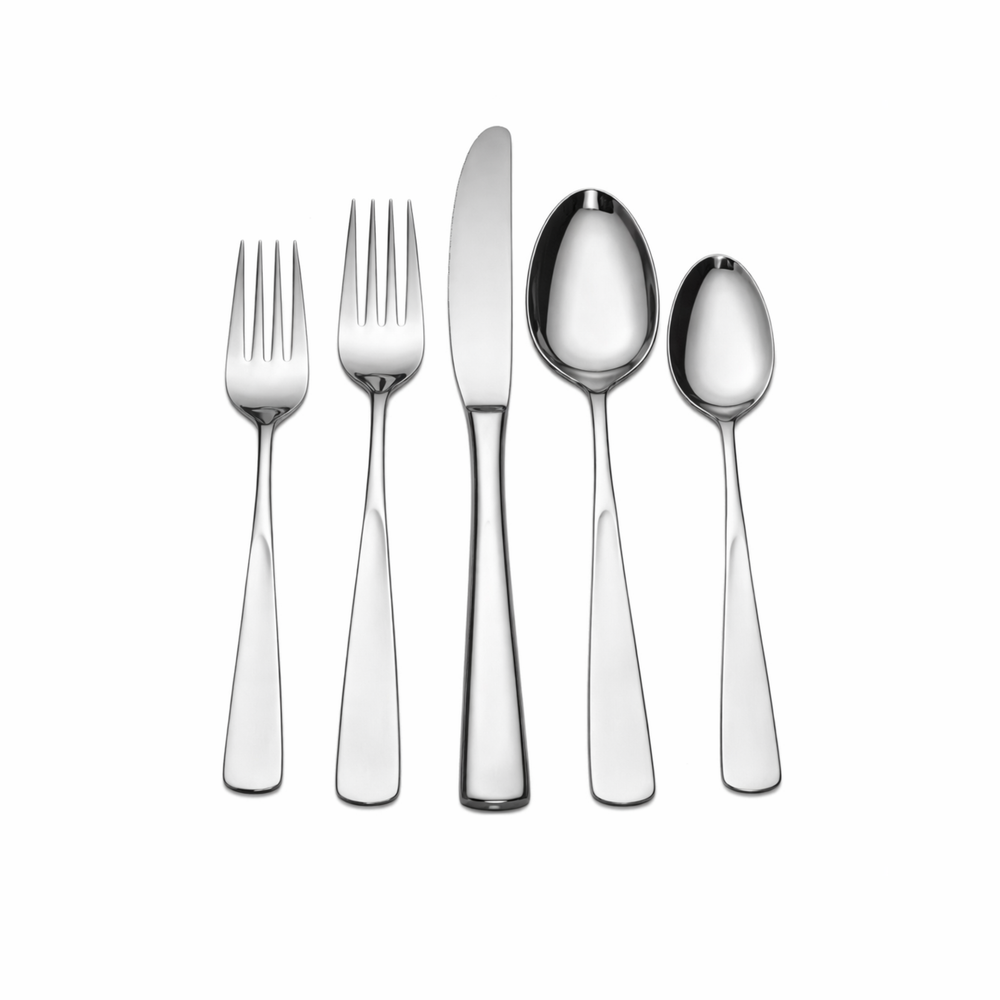 Set of silver cutlery including forks and spoons on a white background