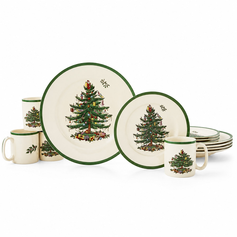 A holiday-themed dinnerware set featuring plates and mugs with a decorated Christmas tree illustration and green rims, displayed on a clean white background.