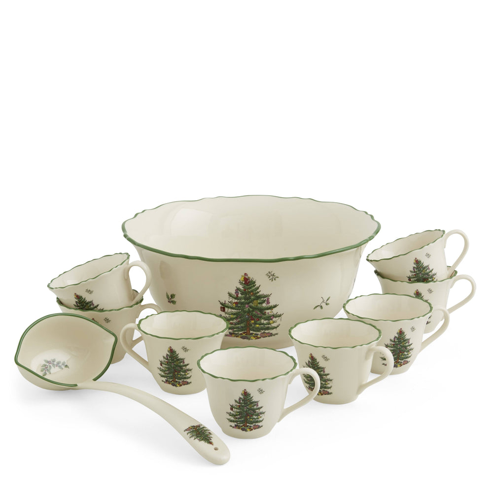 10 cups, a ladle and a large Punch Bowl with Spode Christmas Tree pattern on a white background