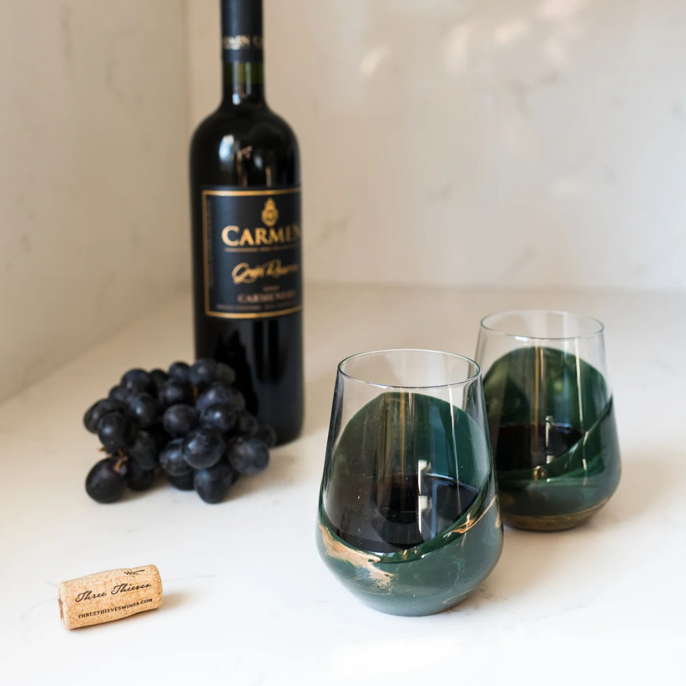 Stemless wine glass set in Jade design by Lynn & Liana, featuring elegant Green and Gold marbled detailing.