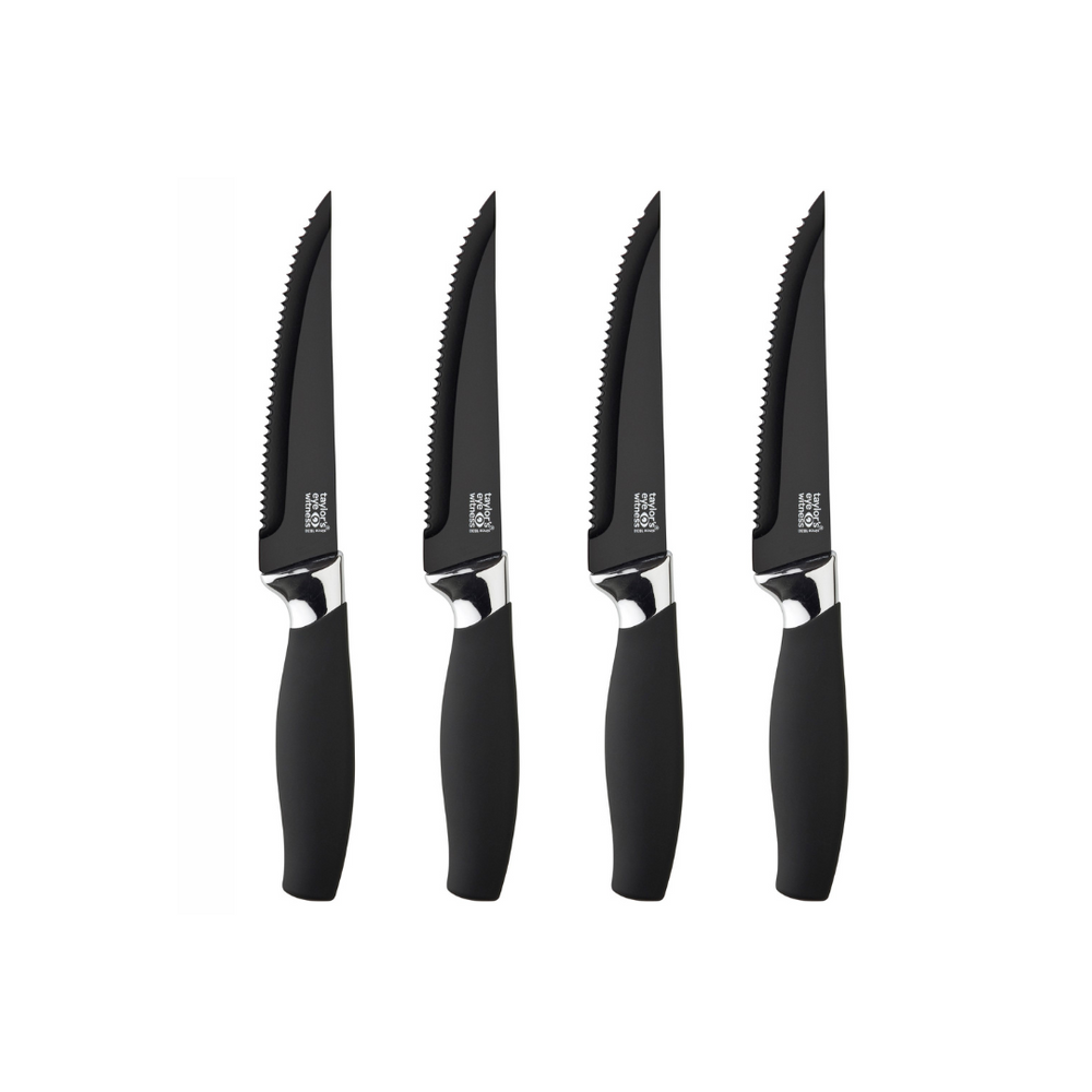 A set of four black steak knives with chrome bolsters and scalloped edges, displayed against a white background.