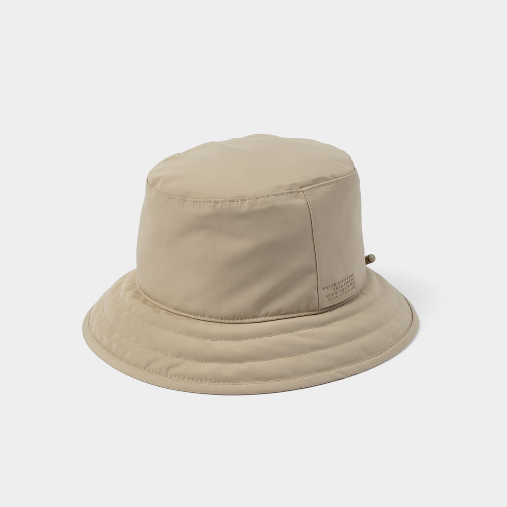 Beige bucket hat on a white background