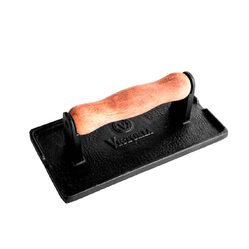 Black metal tool with wooden handle on a white background