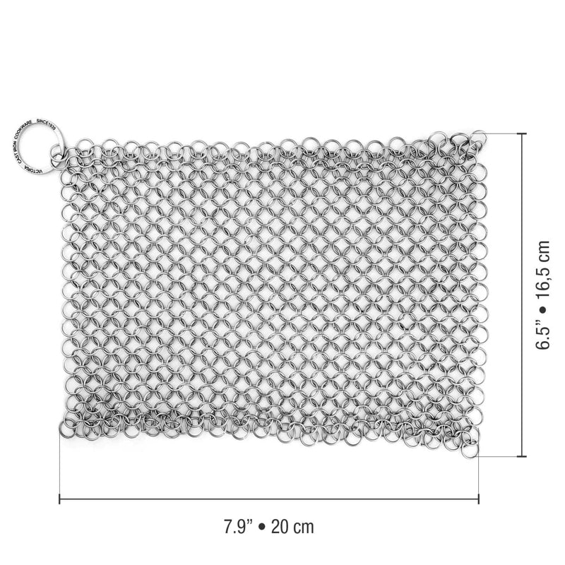 Metal mesh scrubber with dimensions on a white background