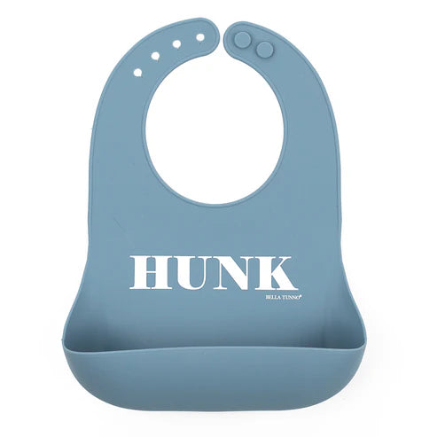 Blue baby bib with 'HUNK' printed on it against a white background