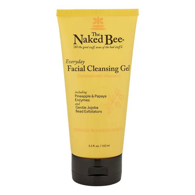 A yellow tube of The Naked Bee Orange Blossom Honey Everyday Facial Cleansing Gel with black cap.