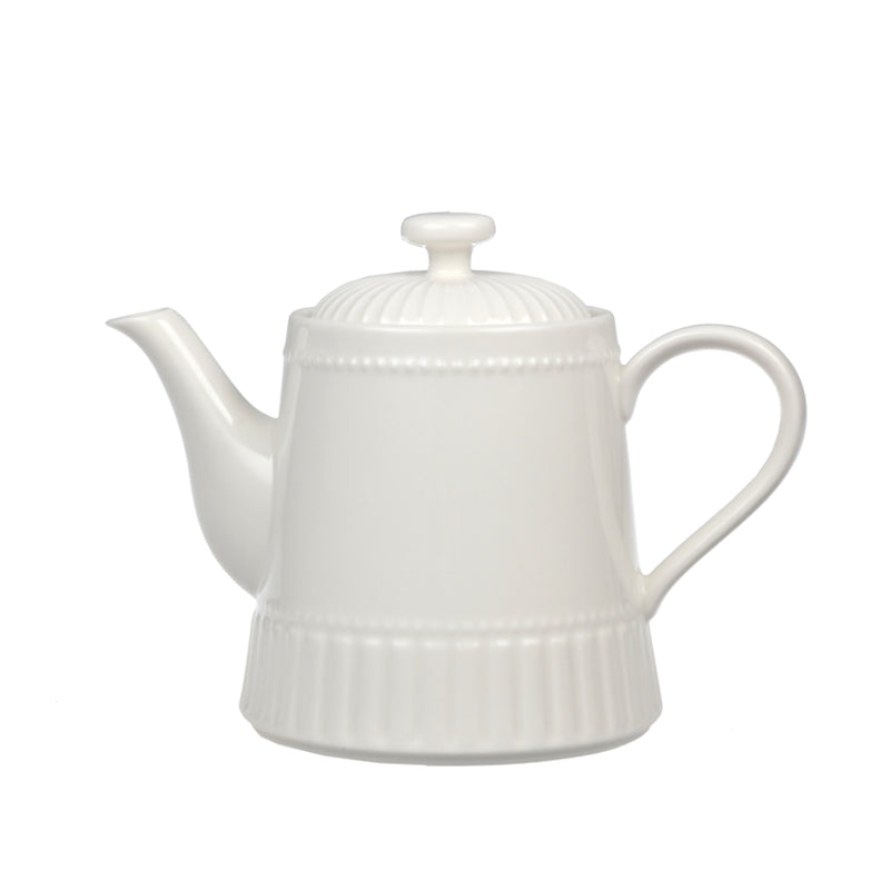 White ceramic teapot on a white background