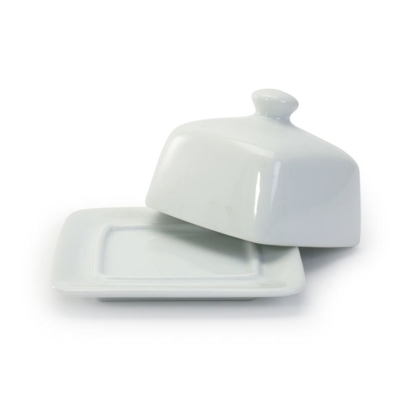 A white, square porcelain butter dish with a cover.
