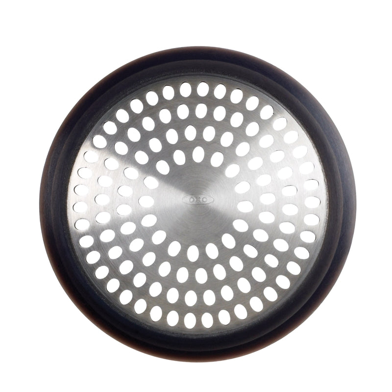 Round metal filter with perforated design on a white background