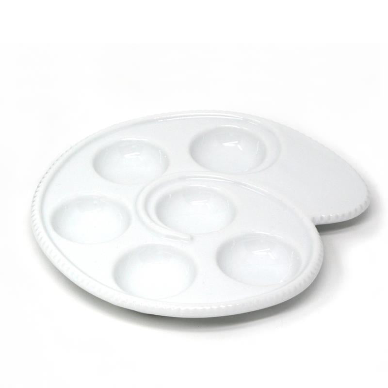 A white, porcelain escargot/mushroom dish with six large holes designed for serving snails or stuffed mushrooms.