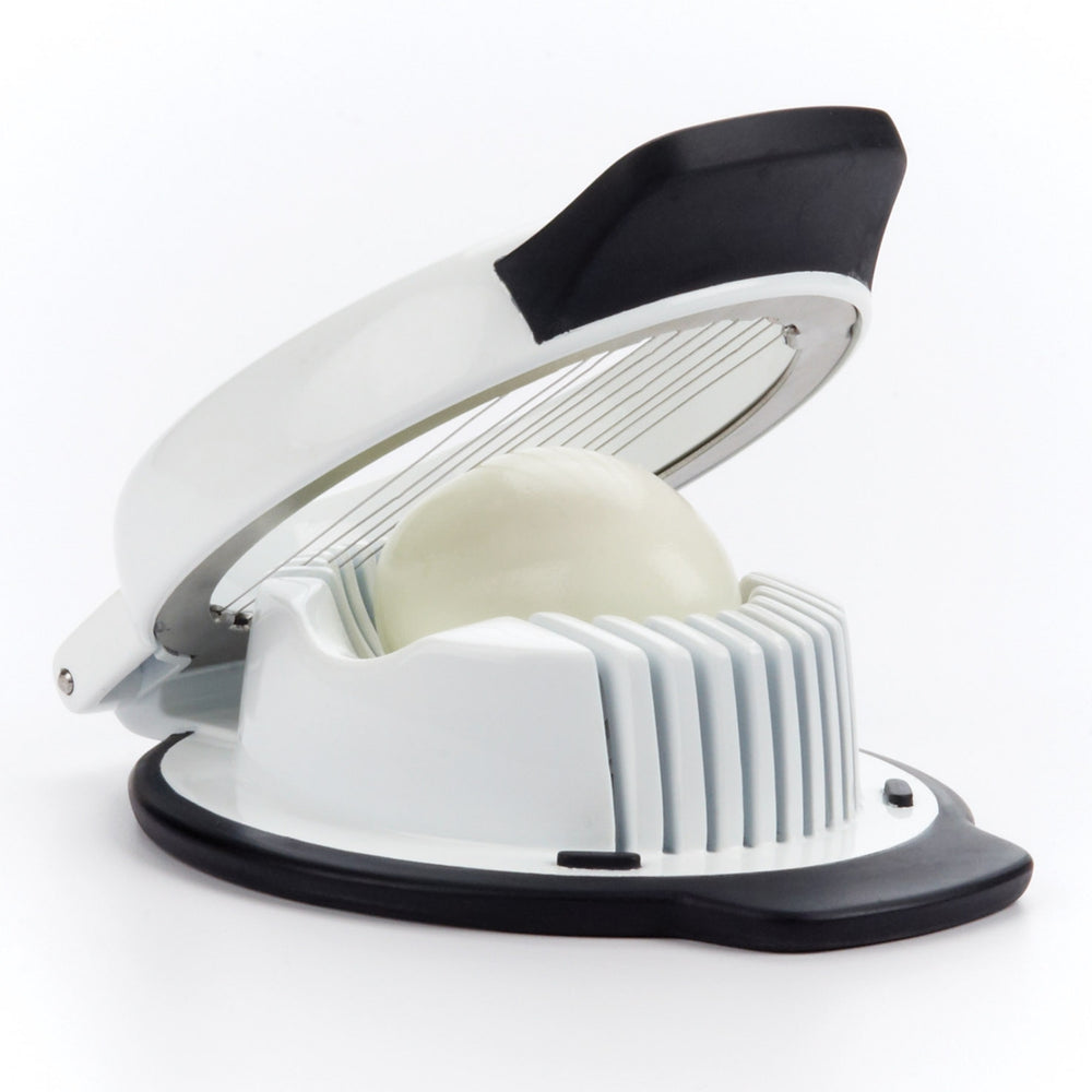 White and black mandoline slicer on a white background